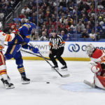 Flames get hot in 2nd period for 7-2 win over Sabres