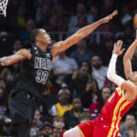 Young's buzzer-beating jumper lifts Hawks past Nets 129-127