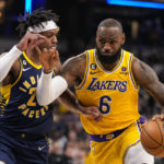 James closes in on scoring record, Lakers rally past Pacers