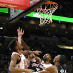 Butler's dunk at end gives Heat 97-95 win over Rockets