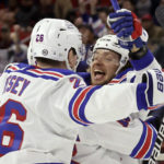 Panarin's 4-goal night helps Rangers stop Hurricanes' streak