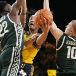 Spartans lose to Michigan in their first game since shooting