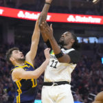 Thompson, Warriors' supporting cast hold off Timberwolves