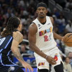 Heat use balanced scoring, rally to beat Magic 106-103 in OT