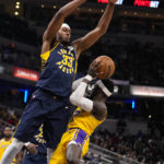 James closes in on scoring record, Lakers rally past Pacers