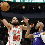 Giannis exits early with knee issue; Bucks rip Heat 128-99