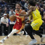 Young scores 27 to lead Hawks past Jazz, 115-108