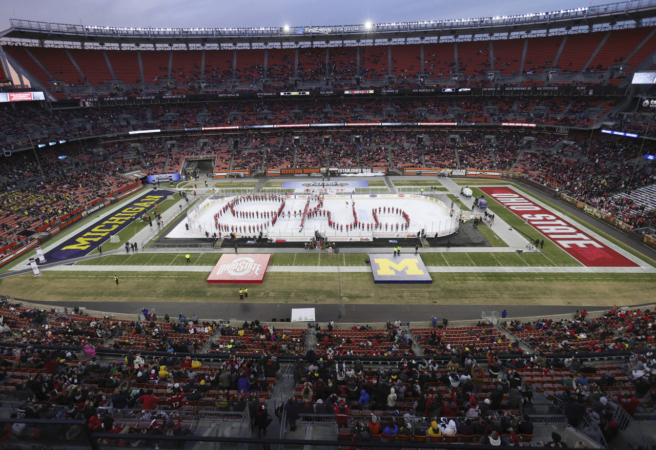 Ohio State's marching band completes a script Ohio on the ice after the second period during the "F...