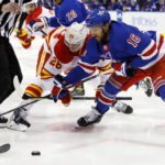 Lafreniere scores in OT to lift Rangers over Flames 5-4