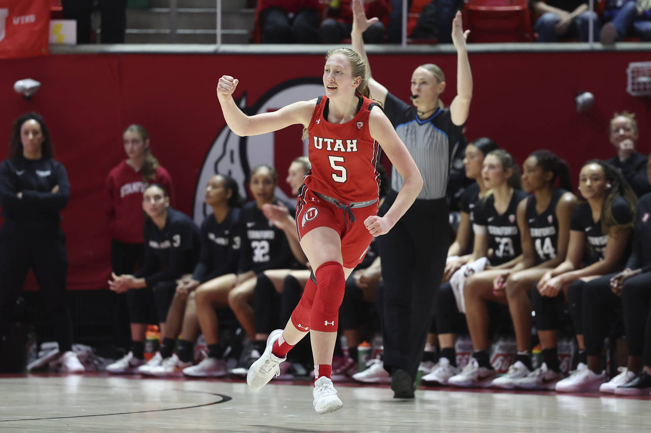 Utah guard Gianna Kneepkens (5) reacts to making a 3-point shot against Stanford in the first half ...
