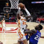 Young scores 36 as Hawks beat short-handed Suns 116-107