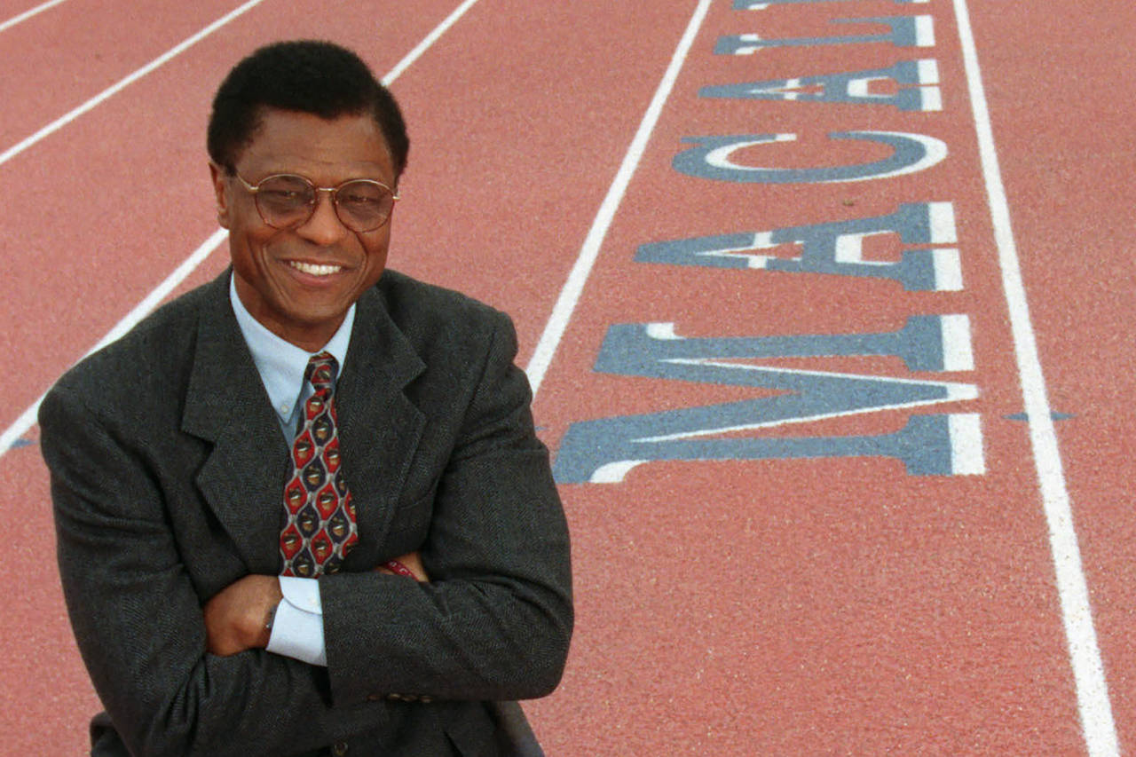 FILE - Irv Cross, a former NFL defensive back who became the first Black man to work full-time as a...