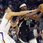 Bucks outlast Suns 104-101 for 14th consecutive victory