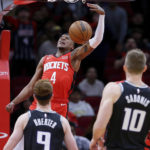 Fox's late FTs gives Kings 130-128 win over Rockets