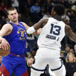 Morant scores 23, Grizzlies rout Nuggets in West showdown