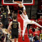 Terps roll in 2nd half, beat No. 21 Northwestern 75-59