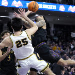 Buie, Audige help Northwestern beat No. 1 Purdue 64-58