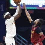Jokic has triple-double, Nugget beat Cavaliers 115-109