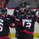 Stutzle scores in OT, Senators rally to beat Flames 4-3