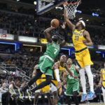 Tatum has 31, breaks tie late in OT, Celtics outlast Pacers