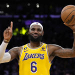 LeBron James makes NBA history on a star-filled night in LA