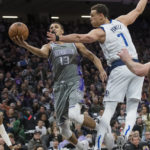 Fox scores 36 points, Kings beat Mavericks 133-128 in OT
