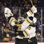 Bruins goaltender Linus Ullmark scores into empty net