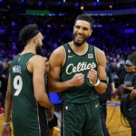 Tatum's late 3 lifts Celtics past Embiid, 76ers 110-107