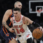 Barrett scores 30, helps Knicks hold off Heat 106-104
