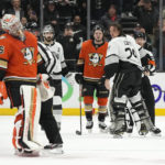 Kings overcome goalie's match penalty, beat rival Ducks 6-3