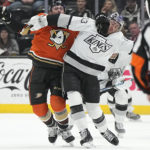 Kings overcome goalie's match penalty, beat rival Ducks 6-3