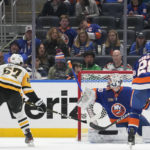 Parise scores late, Nelson nets 2 as Islanders edge Penguins