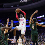 Tatum's late 3 lifts Celtics past Embiid, 76ers 110-107