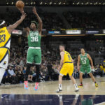 Tatum has 31, breaks tie late in OT, Celtics outlast Pacers