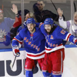 Lafreniere scores in OT to lift Rangers over Flames 5-4