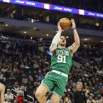 Bucks edge Celtics 131-125 in OT for 11th straight win