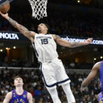Morant scores 23, Grizzlies rout Nuggets in West showdown