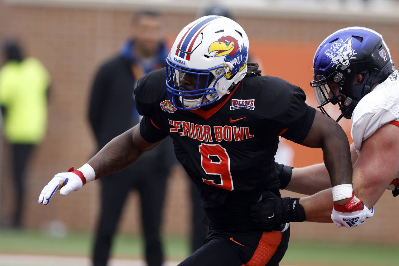 National defensive lineman Lonnie Phelps Jr of Kansas runs drills during practice for the Senior Bo...