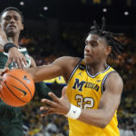 Spartans lose to Michigan in their first game since shooting