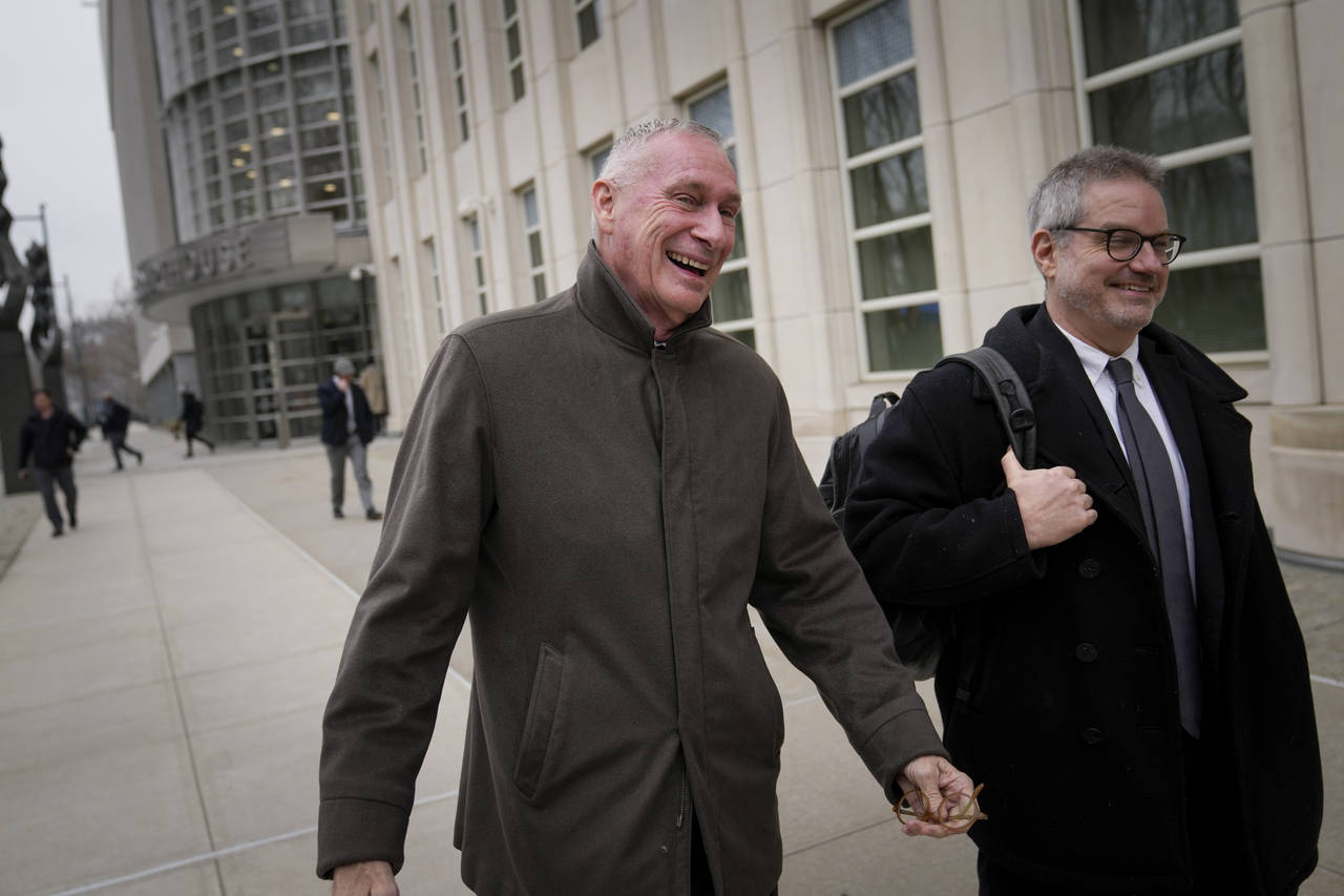 Former ESPN president John Skipper leaves federal court after testifying in a corruption case, Tues...