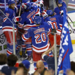 Lafreniere scores in OT to lift Rangers over Flames 5-4