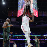 Tatum's late 3 lifts Celtics past Embiid, 76ers 110-107