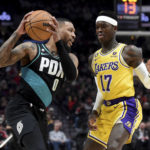 Blazers hit 23 3-pointers, beat LeBron-less Lakers 127-115
