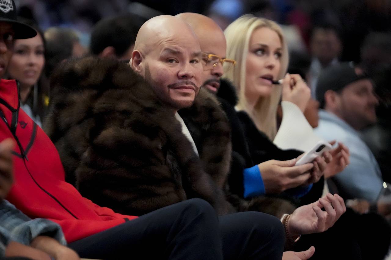 Rapper Fat Joe watches during the first half of the NBA basketball All-Star game Sunday, Feb. 19, 2...