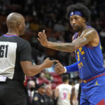 Nikola Jokic scores 27, Nuggets hold off Heat 112-108