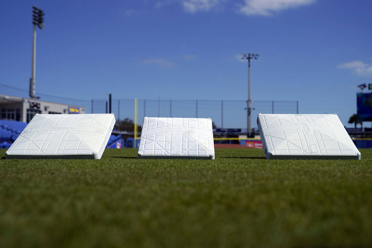 The new, larger base sits next to the older, smaller base at TD Ballpark Wednesday, Feb. 15, 2023, ...