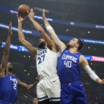 McDaniels has 20 points, Timberwolves beat Clippers 108-101