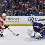 Flames get hot in 2nd period for 7-2 win over Sabres