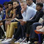 Thompson, Warriors' supporting cast hold off Timberwolves