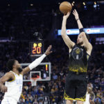 Russell shines in return to Lakers after trade by T-Wolves